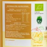 Tabla de información nutricional del Vinagre de Manzana Manare con Cúrcuma y Jengibre, mostrando valores por porción y 100ml, en Emporio Nativo.