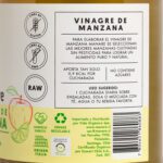 Tabla de información nutricional del Vinagre de Manzana Manare con Limón y Matcha, mostrando valores por porción y 100ml, con sellos de producto sin gluten y sin azúcares, en Emporio Nativo.